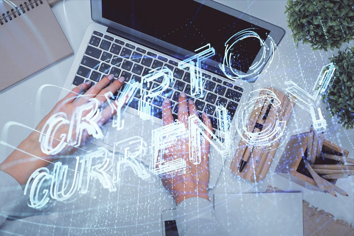 double exposure of woman hands working on computer and blockchain theme hologram drawing. top view. bitcoin cryptocurrency concept.